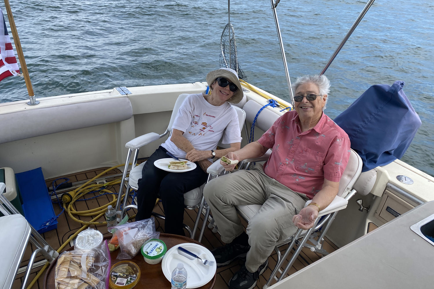 Man and woman sitting in a boatWoman 