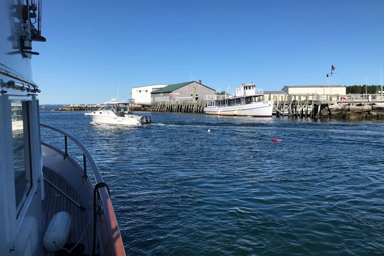 Boat passing by the pier